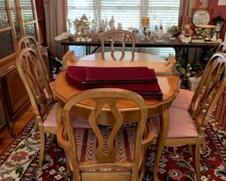 #15	Wood Table w/6 Chairs (1 captains chair)  - 40x-68-92x30 w/pads & 3 leaves	 $175.00 			
