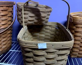 #216	Longaberger 2 Baskets, 1 Tall with Handle, 1 Small with Strap Back	 $35.00 			
