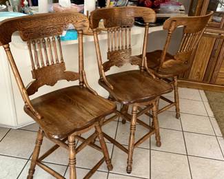 #27	Oak Swivel Carved Back Bar Stools - sold as a set- 24" Seat Height	 $90.00 			
