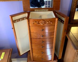 #43	Wood Jewelry Armoire - 6 drawers w/2 flip-out sides & flip-up top - 16x10x40	 $75.00 			
