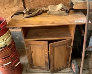 #143	2 Door 1 Shelf Wood Cabinet 34x18x32	 $40.00 			
