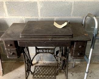 #92	Singer Treadle Cabinet w/sewing machine (as is condition)	 $75.00 			
