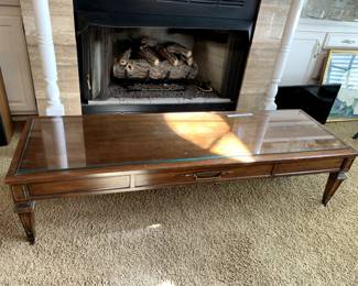 #29	Wood Coffee Table w/glass protect - (as is finish) on wheels - 60x19x14	 $40.00 			
