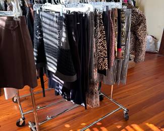 Mostly  all of my client’s clothing is high end brands.   One big bedroom has been set up as a closet.   Tons of clothing and belts.  