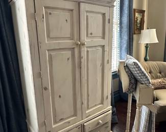 Believe it or not this is a wardrobe!  Not a TV cabinet.  Has a hanging rod for clothing! 