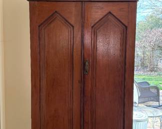 Mud Room in a Cabinet! Antique Cabinet Armoire with Blend of Gothic Revival and Federalist Styling. Interior Outfitted with Hooks For Hanging Coats. Measures 48” W x 15” D x 84” H. Photo 1 of 5.