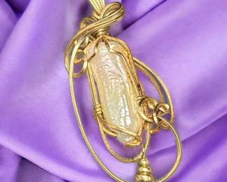 Pearl Wrapped In 14kt Gold