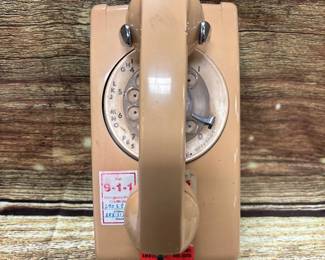 vintage ITT rotary wall phone, peach colored, good condition