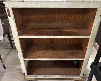 wood shelving on wheels, sturdy, needs new paint job, 31x14