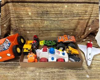 Box lot- monster truck, plane, yellow dump trucks