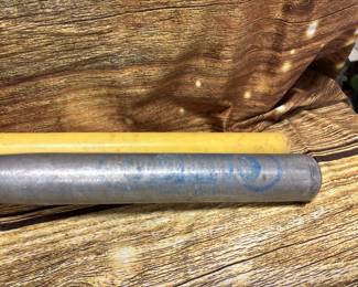 Metal and wood baseball bats