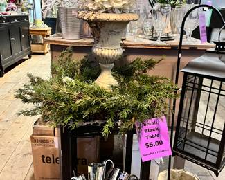 Small black table, planter, Shepard hooks. Rose 🌹 ball's red, pink and white available, various sizes