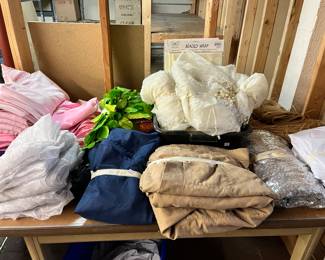 Large assortment of table clothes. 120” round, 90”round, and various sizes