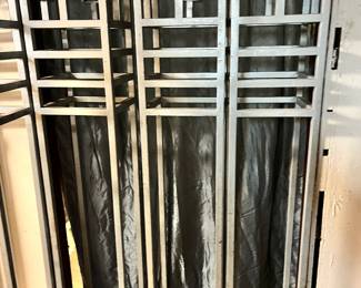 4 tall metal columns 