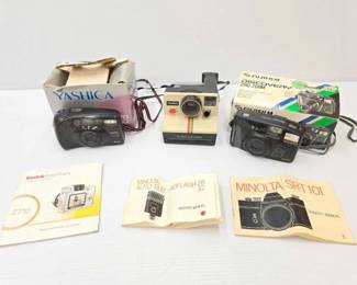 #240 • (3) Vintage Cameras & Owner Manuals
