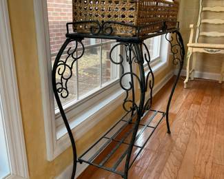 #8	Wrought Iron and Punched Metal plant stand, w/removable cane basket. 30x10x36	 $ 50.00 																							