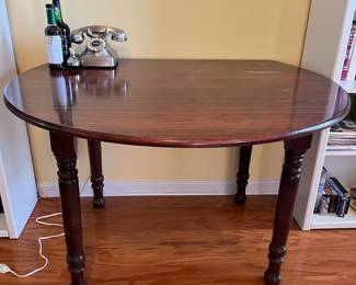#10	Drop leaf round dining room table. Turned legs. *as is finish* 48" round x 30"	 $ 35.00 																							
