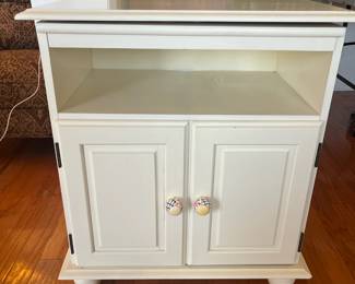 #9	Swivel Top White Cabinet. 2 doors, 2 shelves. 28x17x32	 $ 40.00 																							