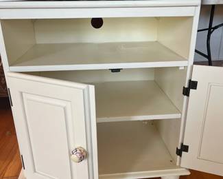 #9	Swivel Top White Cabinet. 2 doors, 2 shelves. 28x17x32	 $ 40.00 																							
