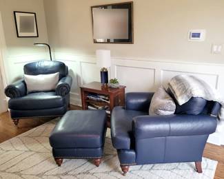 Whittemore Sherrill Blue Leather studded armchairs with ottoman.