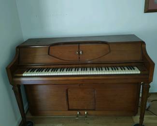Player Piano with 25 Music Rolls.  $500 OBO.  Still pretty much in tune 