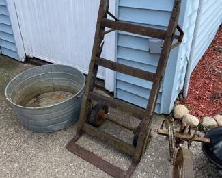 Vintage cart, washtub, plow parts