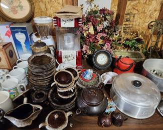 Kitchenware overflowing to Shed