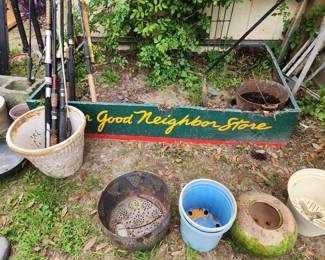"It's A Good Neighbor Store" metal planter
