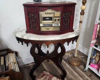 Every inch of this house is full! Here we go!! Antique Marble Top Table - Radio Record Player - Foot Stool - Vintage Marbles - Antique Tom's Peanut Jar