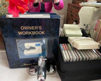 Janome Embroidery discs and workbook. Sold with the sewing machine