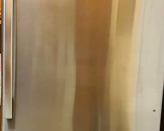 Stainless Whirlpool Refrigerator.