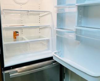 Stainless Whirlpool Refrigerator.