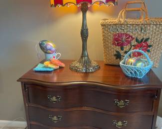 Beautiful claw foot serpentine front dresser 