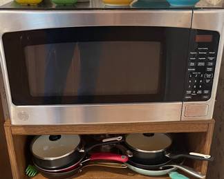 Large Microwave and microwave cart, pots and pans ( many new)