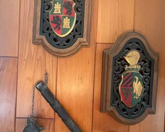 Just look at this awesome flail and pair of vintage iron crest coat of arms