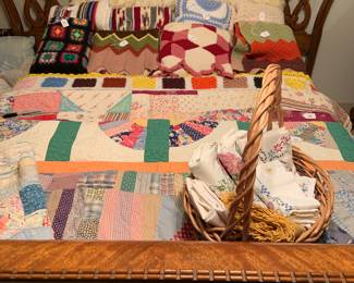 king size headboard, hand made quilts and crocheted throws