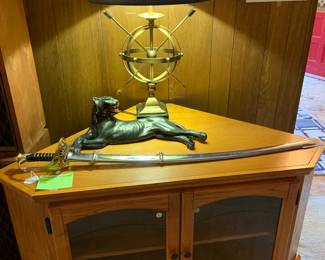 corner cabinet, commemorative sword, black panther, awesome lamp