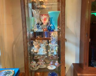 tall, lighted, glass display case