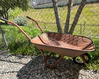 Rusty Wheel Barrel: Use as a Charming Planter