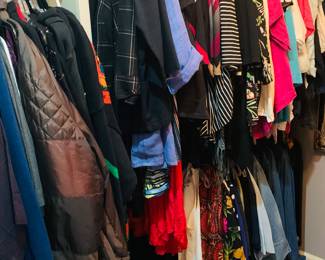 closet filled with larger ladies clothing