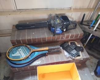 Tennis rackets and chain saw