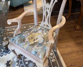 Check out that arm chair . The carved detail and whitewash finish go so well together.