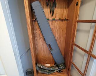 Gun cabinet with rifle case