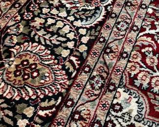 detailed view of the 100% wool hand-made/hand-tied fringe area rug (10' x 15'.5") 