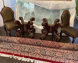 Large area rug (100% wool hand-made) and pedestals for glass-topped table (behind - wrapped and ready to go) and dining chairs (10 available:  8 side and 2 arm)