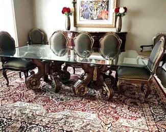 100% wool handmade rug (10x15); double pedestal dining table; 10 dining chairs