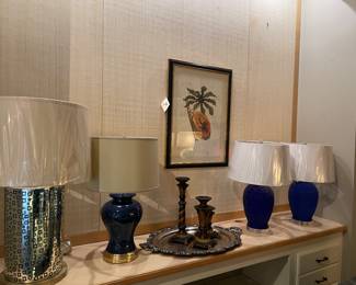 Blue lamps with white shades, silver-plated gray shown with pillar candle holders, gold and blue lamps,  mango lithograph