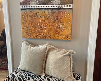 Upholstered bench with nailhead trim and multi-media canvas 