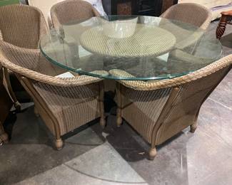 Wicker Patio set with 6 chairs and 48" round glass-topped table - all season items and the winter cover is included.
