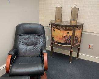 Leather rocker-recliner and ottoman, demi-lune hand-painted table, and burnished brass lamps (pair)